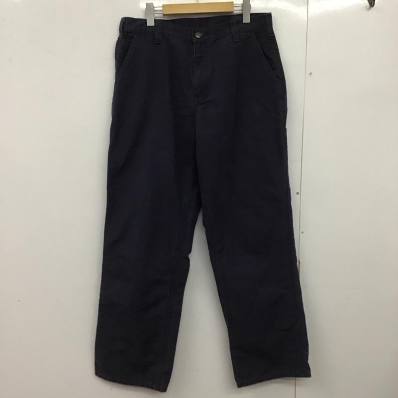 カーハート Carhartt パンツ ワークパンツ、ペインターパンツ ワイドパンツ カジュアルパンツ ワークパンツ 34インチ ロゴ、文字 紺 / ネイビー /  メンズ USED 古着 中古 10148529