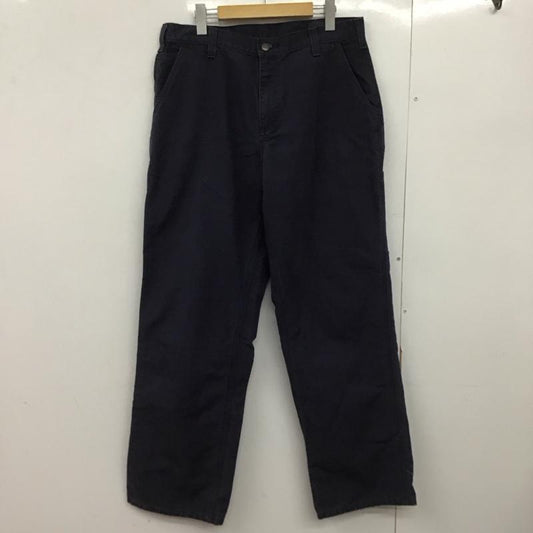 カーハート Carhartt パンツ ワークパンツ、ペインターパンツ ワイドパンツ カジュアルパンツ ワークパンツ 34インチ ロゴ、文字 紺 / ネイビー /  メンズ USED 古着 中古 10148529