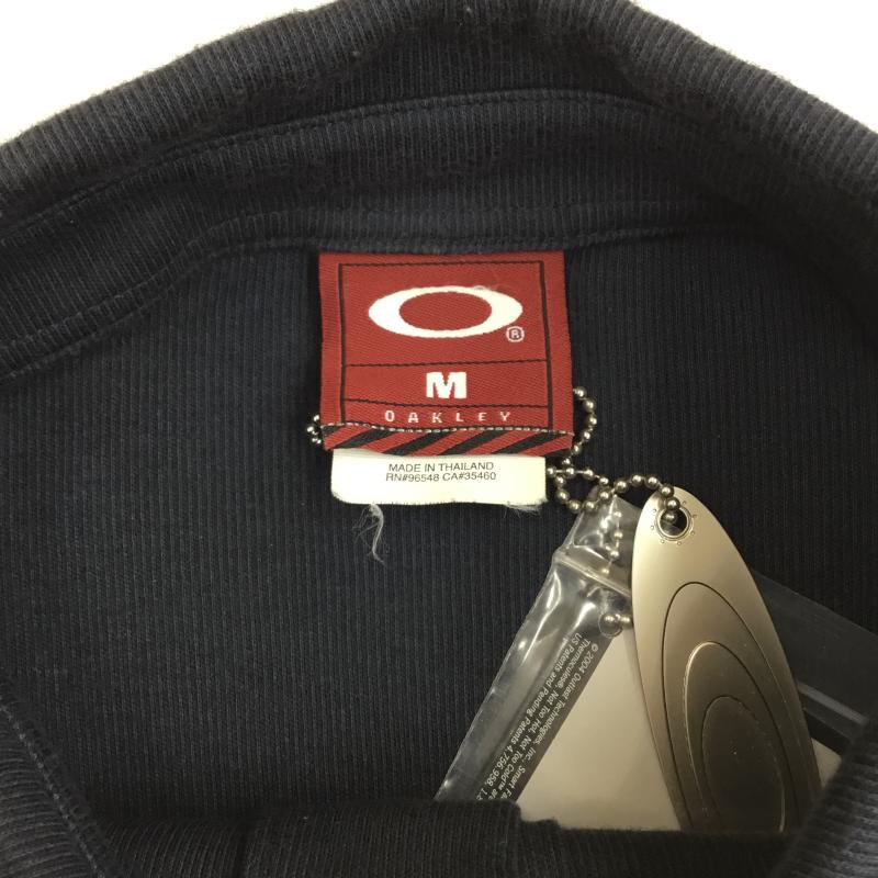 オークリー OAKLEY ポロシャツ 長袖 M ロゴ、文字 紺 / ネイビー /  メンズ USED 古着 中古 10137471