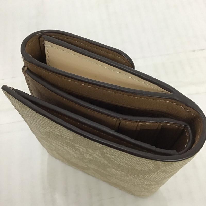 コーチ COACH 財布 二つ折り シグネチャー ロゴ、文字 ベージュ / ベージュ /  レディース USED 古着 中古 10111522