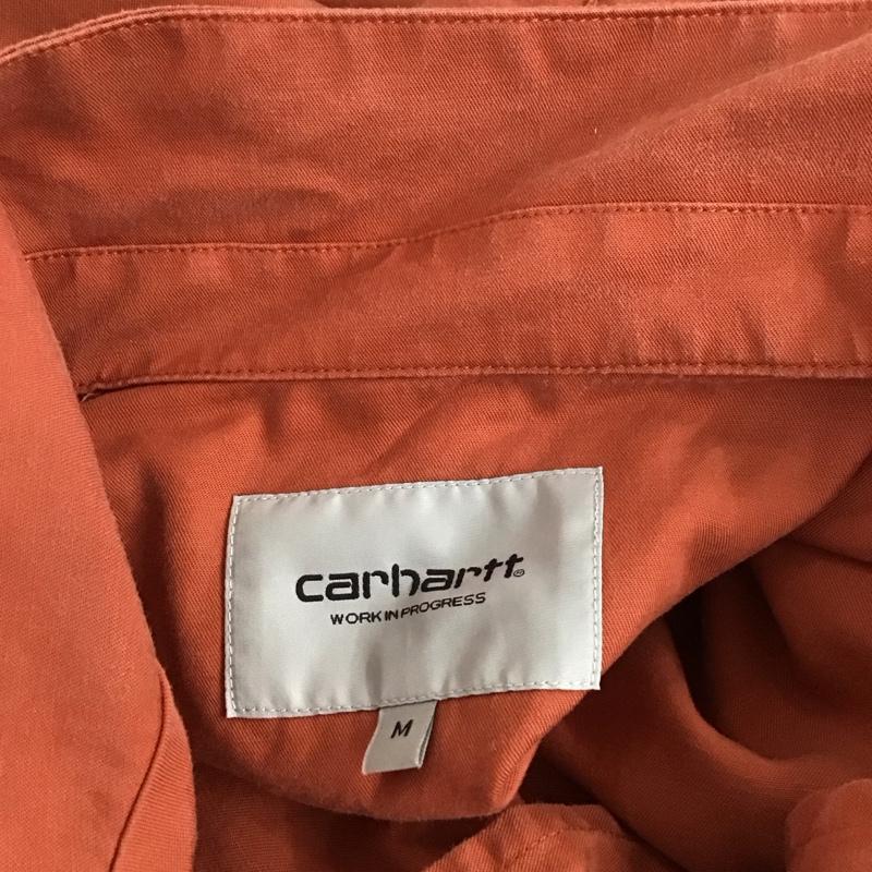 カーハート Carhartt シャツ、ブラウス 半袖 半袖シャツ 前ボタンシャツ カジュアルシャツ M ロゴ、文字 橙 / オレンジ /  メンズ USED 古着 中古 10125749