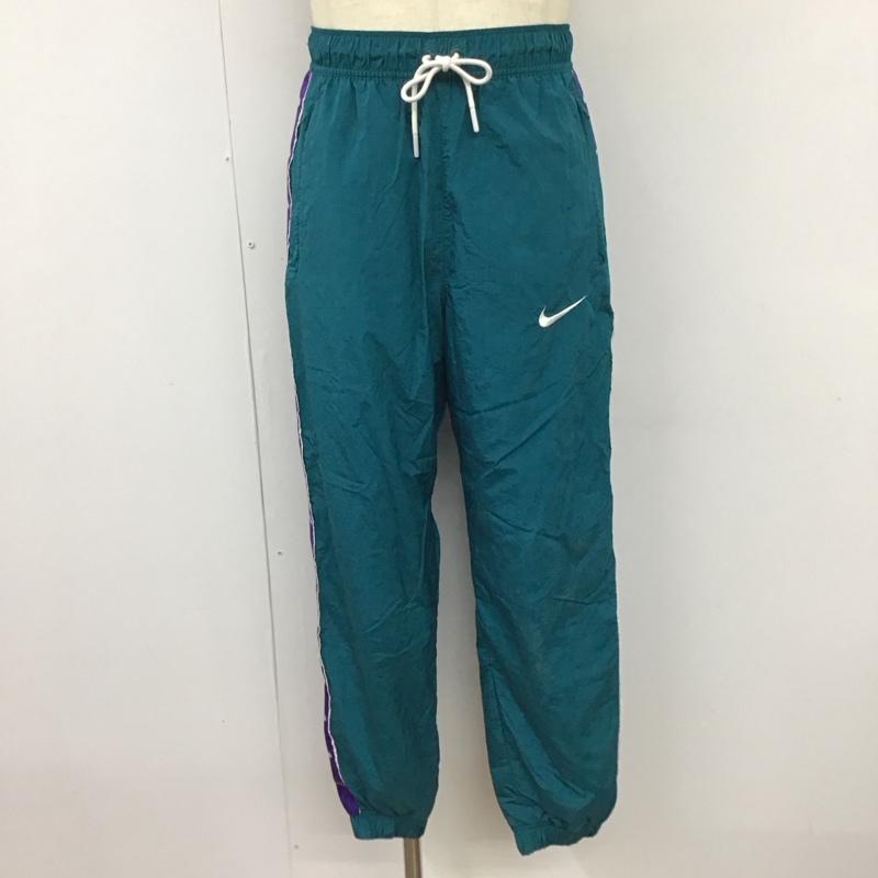ナイキ NIKE パンツ ワークパンツ、ペインターパンツ cv9180-381 ワイドパンツ ジャージ ナイロンパンツ M ロゴ、文字 青 / ブルー /  メンズ USED 古着 中古 10119962
