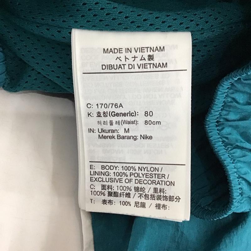 ナイキ NIKE パンツ ワークパンツ、ペインターパンツ cv9180-381 ワイドパンツ ジャージ ナイロンパンツ M ロゴ、文字 青 / ブルー /  メンズ USED 古着 中古 10119962