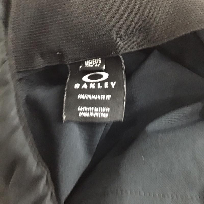 オークリー OAKLEY パンツ ワークパンツ、ペインターパンツ ワークパンツ ワイドパンツ カジュアルパンツ ストレッチ M ロゴ、文字 黒 / ブラック /  メンズ USED 古着 中古 10130709