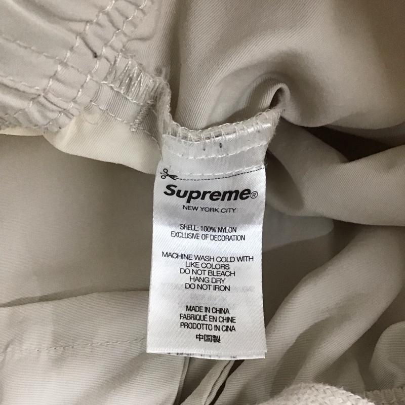 シュプリーム Supreme パンツ ワークパンツ、ペインターパンツ 22AW ナイロンウォームアップパンツ ワイドパンツ XL ロゴ、文字 マルチカラー / マルチカラー /  メンズ USED 古着 中古 10144970