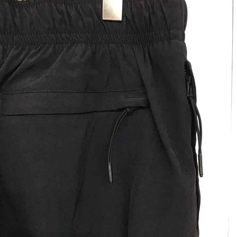 ナイキ NIKE パンツ ワークパンツ、ペインターパンツ fb8617-010 ウィンターウーブンパンツ ワイドパンツ スポーツウェア XL ロゴ、文字 黒 / ブラック /  メンズ USED 古着 中古 10142342