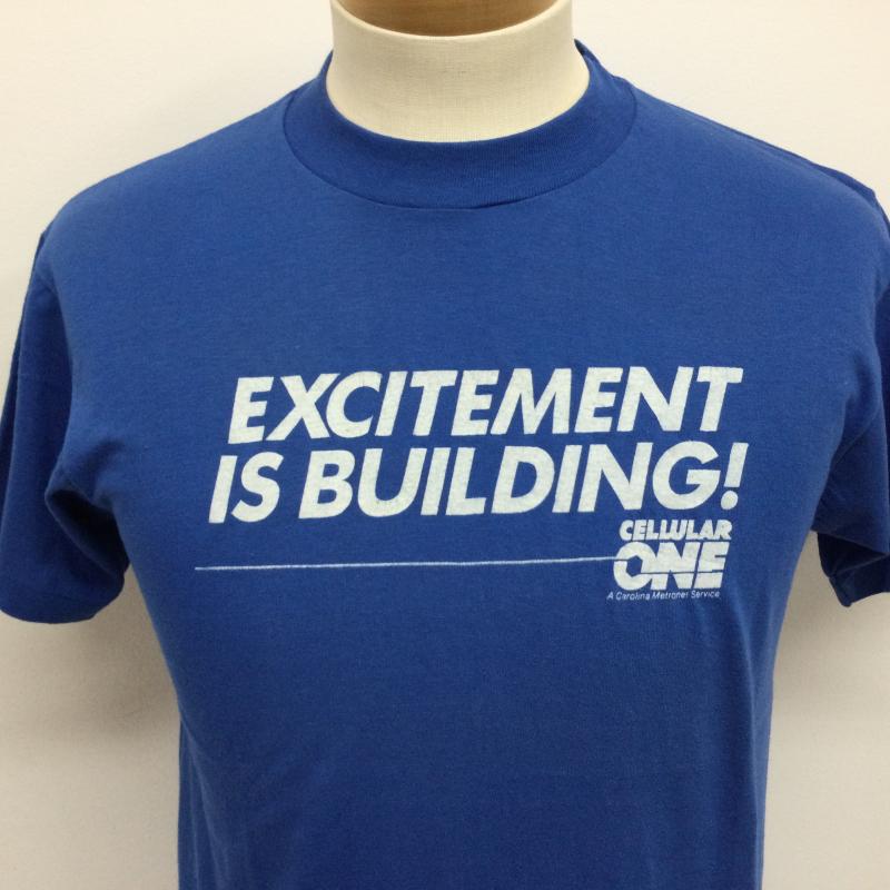 ヘインズ HANES Tシャツ 半袖 90’s USA製 Fifty-Fifty 半袖Tシャツ EXCITEMENT IS BUILDINGロゴプリント ヴィンテージ TEE M ロゴ、文字 青 / ブルー / blue メンズ USED 古着 中古 50108916