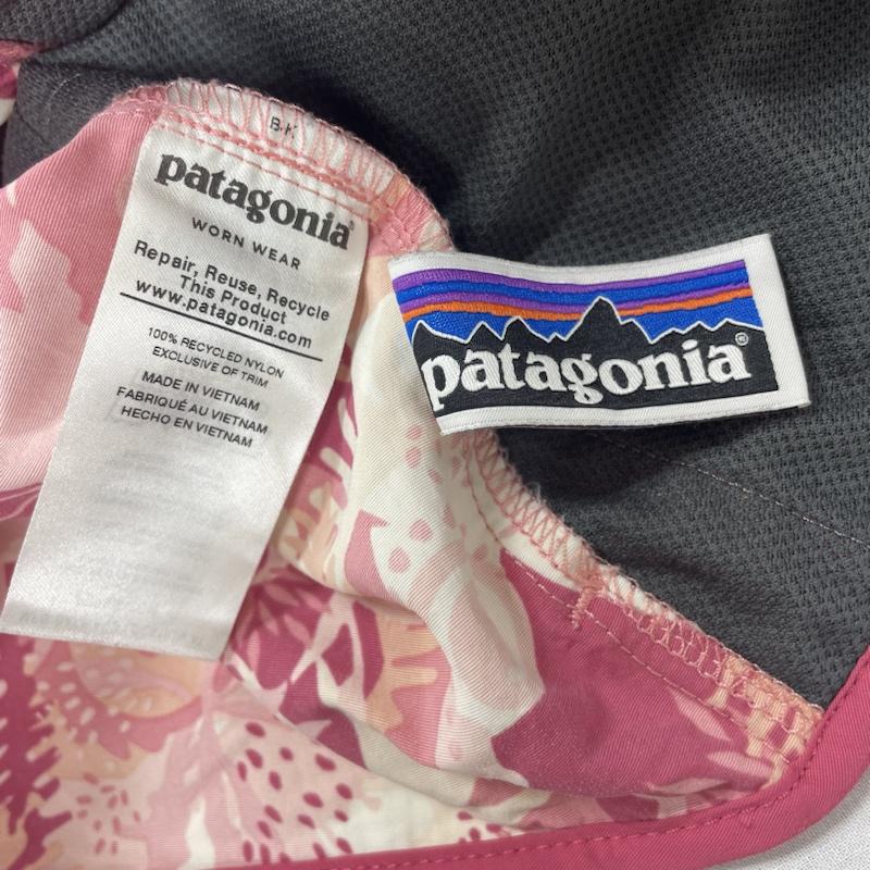 パタゴニア patagonia ジャケット、上着 ジャンパー、ブルゾン キッズ 2019ss Baggies Jacket バギーズジャケット フード着脱可 60289 4 総柄 X ロゴ、文字 桃 / ピンク / pink X 橙 / オレンジ / orange X 白 / ホワイト / white ガールズ USED 古着 中古 50114304