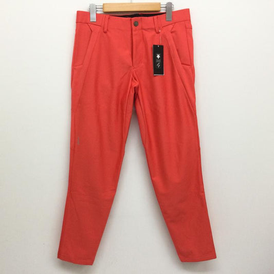 デサント DESCENTE ボトムス ボトムス DGM0JD05 BASIC SERIES PT-ZERO 立体的裁断 機能性 防滑性 ドライタッチ ゴルフパンツ タグ付 M 無地 X ワンポイント 橙 / オレンジ / orange メンズ USED 古着 中古 50117296