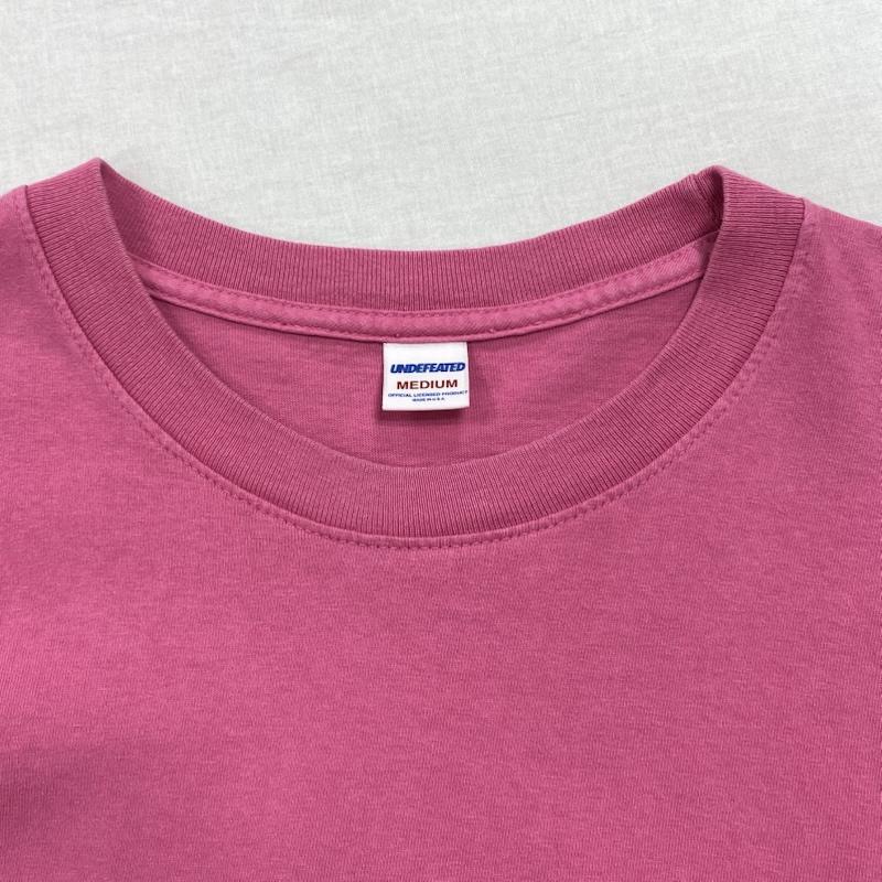 アンディフィーテッド UNDEFEATED Tシャツ 長袖 クルーネック 袖ロゴ プリント 190077001013 M ロゴ、文字 X プリント 桃 / ピンク / pink メンズ USED 古着 中古 50125151