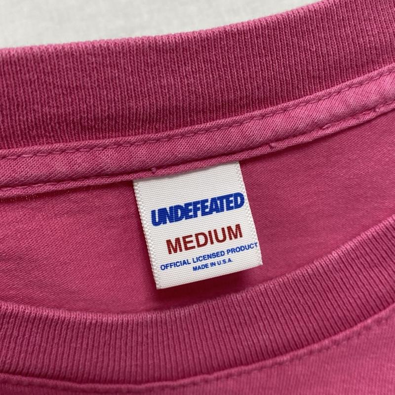 アンディフィーテッド UNDEFEATED Tシャツ 長袖 クルーネック 袖ロゴ プリント 190077001013 M ロゴ、文字 X プリント 桃 / ピンク / pink メンズ USED 古着 中古 50125151