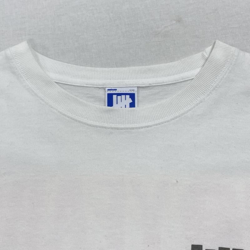 アンディフィーテッド UNDEFEATED Tシャツ 長袖 クルーネック 袖ロゴ 両面プリント 207078001004 M ロゴ、文字 X プリント 白 / ホワイト / white メンズ USED 古着 中古 50125153