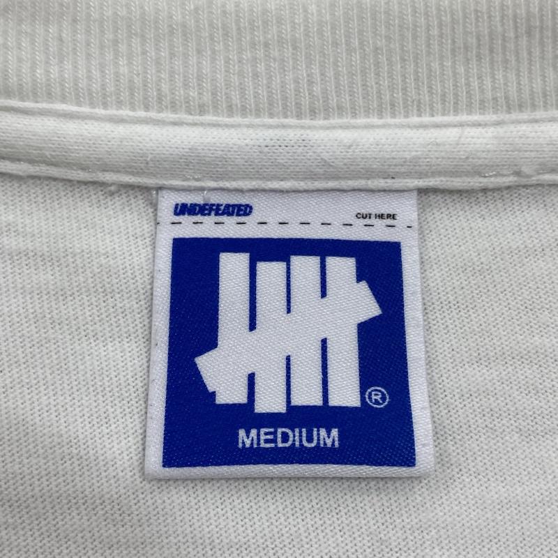 アンディフィーテッド UNDEFEATED Tシャツ 長袖 クルーネック 袖ロゴ 両面プリント 207078001004 M ロゴ、文字 X プリント 白 / ホワイト / white メンズ USED 古着 中古 50125153