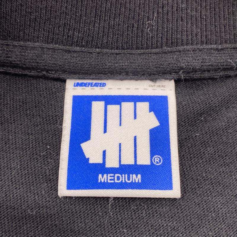 アンディフィーテッド UNDEFEATED Tシャツ 長袖 クルーネック 袖ロゴ 両面プリント 207078001004 M ロゴ、文字 X プリント 黒 / ブラック / black メンズ USED 古着 中古 50125154