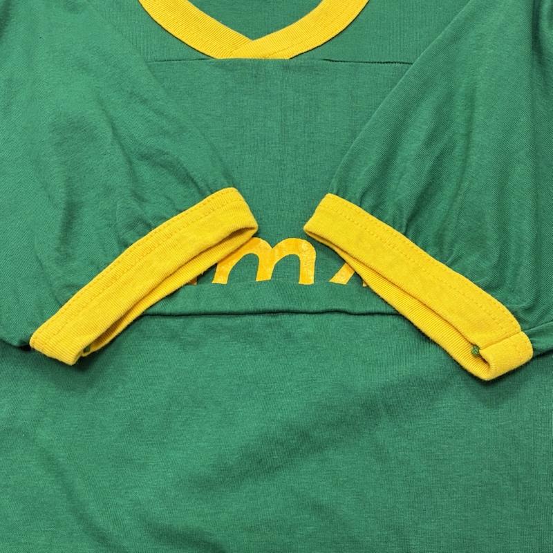 ヴィンテージ VINTAGE Tシャツ 半袖 Eagle Athletics アメリカン フットボール USA製 裾シングルステッチ リンガー Tシャツ L ロゴ、文字 X プリント 緑 / グリーン / green X 黄 / イエロー / yellow メンズ USED 古着 中古 50134221