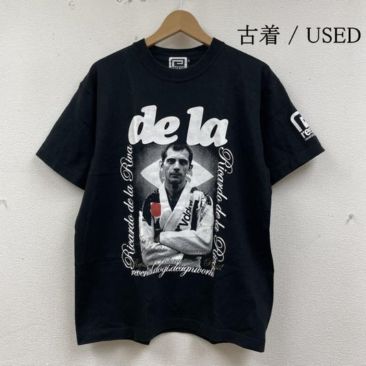 リバーサル reversal Tシャツ 半袖 半袖 Tシャツ RICARDO DE LA RIVA CUP2009 開催記念 DE LA RIVA 限定モデル L ロゴ、文字 X  X プリント 黒 / ブラック / black メンズ USED 古着 中古 50135089