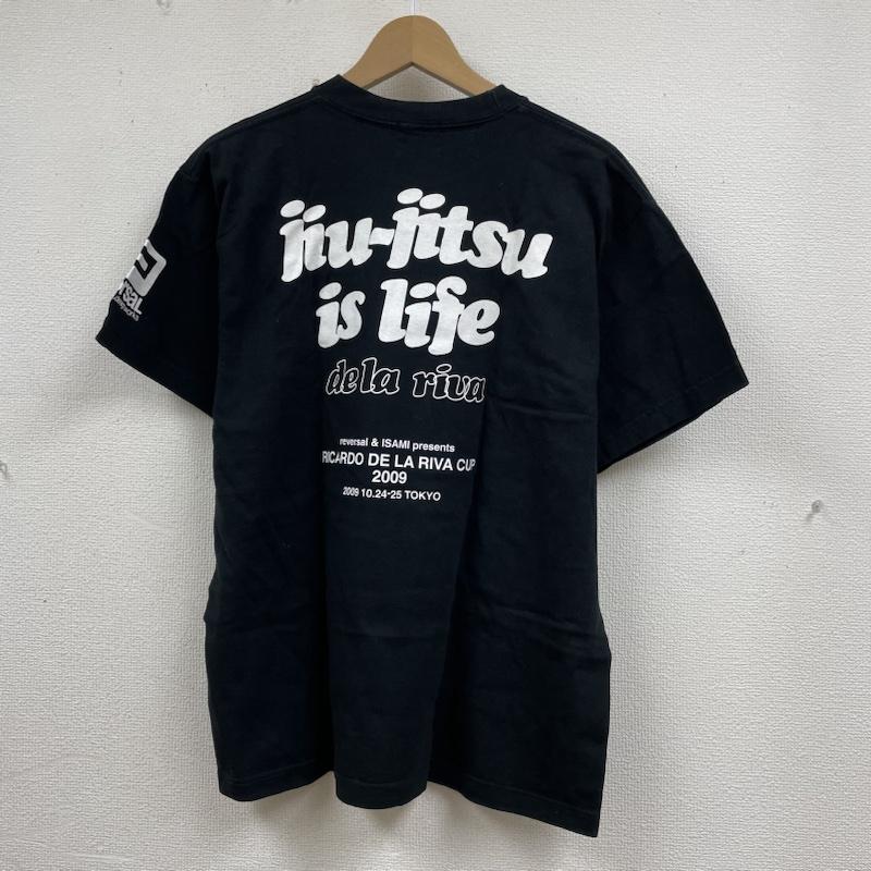 リバーサル reversal Tシャツ 半袖 半袖 Tシャツ RICARDO DE LA RIVA CUP2009 開催記念 DE LA RIVA 限定モデル L ロゴ、文字 X  X プリント 黒 / ブラック / black メンズ USED 古着 中古 50135089