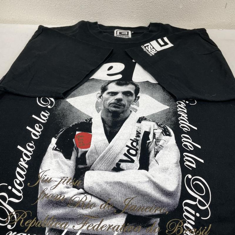 リバーサル reversal Tシャツ 半袖 半袖 Tシャツ RICARDO DE LA RIVA CUP2009 開催記念 DE LA RIVA 限定モデル L ロゴ、文字 X  X プリント 黒 / ブラック / black メンズ USED 古着 中古 50135089