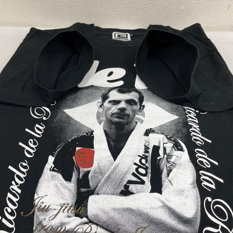リバーサル reversal Tシャツ 半袖 半袖 Tシャツ RICARDO DE LA RIVA CUP2009 開催記念 DE LA RIVA 限定モデル L ロゴ、文字 X  X プリント 黒 / ブラック / black メンズ USED 古着 中古 50135089