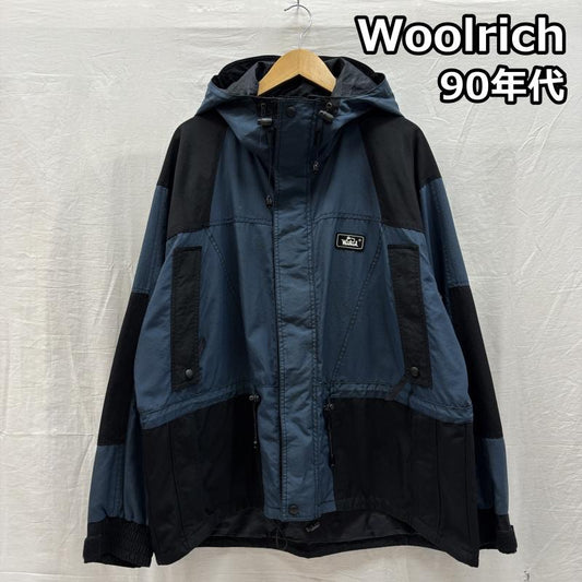 ウールリッチ WOOLRICH ジャケット、上着 ジャンパー、ブルゾン 90s 配色 切替 ナイロン マウンテンパーカー ドローストリング ヴィンテージ L ワンポイント X ロゴ、文字 紺 / ネイビー / navy X 黒 / ブラック / black メンズ USED 古着 中古 50146020