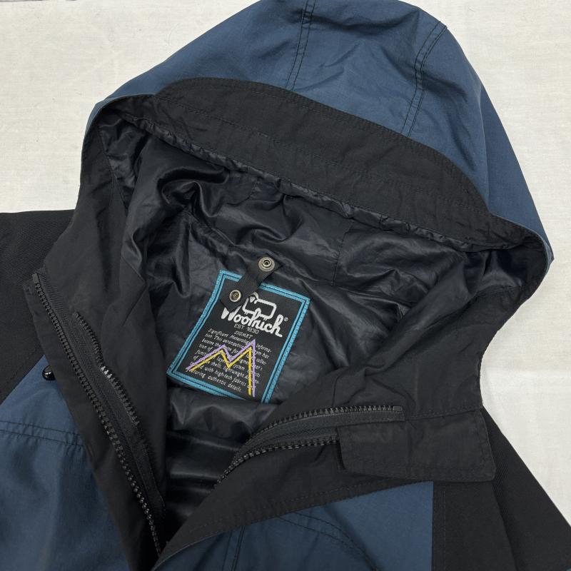 ウールリッチ WOOLRICH ジャケット、上着 ジャンパー、ブルゾン 90s 配色 切替 ナイロン マウンテンパーカー ドローストリング ヴィンテージ L ワンポイント X ロゴ、文字 紺 / ネイビー / navy X 黒 / ブラック / black メンズ USED 古着 中古 50146020