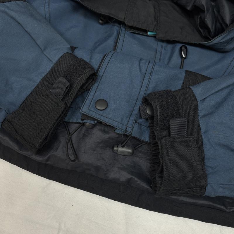 ウールリッチ WOOLRICH ジャケット、上着 ジャンパー、ブルゾン 90s 配色 切替 ナイロン マウンテンパーカー ドローストリング ヴィンテージ L ワンポイント X ロゴ、文字 紺 / ネイビー / navy X 黒 / ブラック / black メンズ USED 古着 中古 50146020
