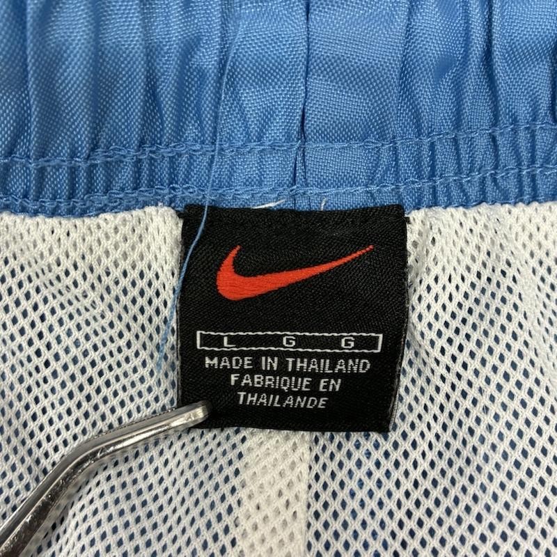 ナイキ NIKE ボトムス ボトムス 00s ライン イージー ナイロン トラックパンツ 裏メッシュ 裾ジップ 刺繍 ロゴ L ロゴ、文字 X 刺繍 水色 / ライトブルー / メンズ USED 古着 中古 50148780
