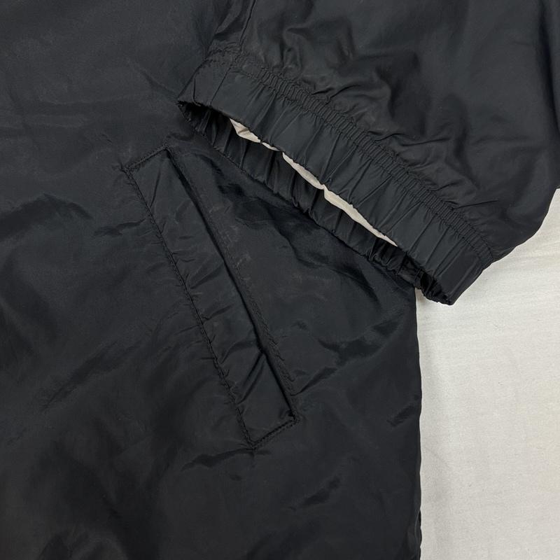 ナイキ NIKE ジャケット、上着 ジャンパー、ブルゾン タイ製 スタンドカラー フード収納 ジップアップ 中綿 ナイロン ジャケット L 黒 / ブラック / black メンズ USED 古着 中古 50148816