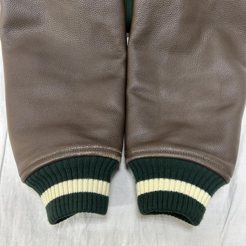 アヴィレックス AVIREX ジャケット、上着 ジャンパー、ブルゾン 783-3252047 NYC STADIUM JACKET green×brown レザー切り替えし ワッペンデザイン L ロゴ、文字 緑 / グリーン / green X 茶 / ブラウン / brown メンズ USED 古着 中古 50152038