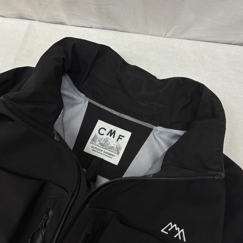 コムフィアウトドアガーメント COMFY OUTDOOR GARMENT ジャケット、上着 ジャンパー、ブルゾン GUIDE SHELL MOD COEXIST フード収納 ナイロン シェル ジャケット CMF2402-J11C L 黒 / ブラック / black メンズ USED 古着 中古 50155113