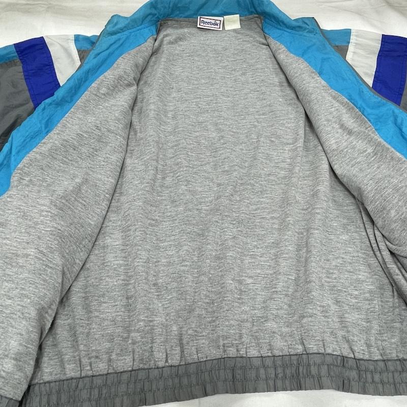 リーボック Reebok ジャケット、上着 ジャンパー、ブルゾン ナイロンジャケット ジップアップ フルジップ ヴィンテージ ロゴ 刺繍 - ロゴ、文字 X 刺繍 灰 / グレー / gray X 水色 / ライトブルー / X 青 / ブルー / blue X 白 / ホワイト / white メンズ USED 古着 中古 50155950