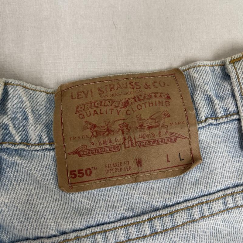リーバイス Levi s パンツ デニム、ジーンズ USA製 550 ボタン裏 573 デニム パンツ L 水色 / ライトブルー / メンズ USED 古着 中古 50156396