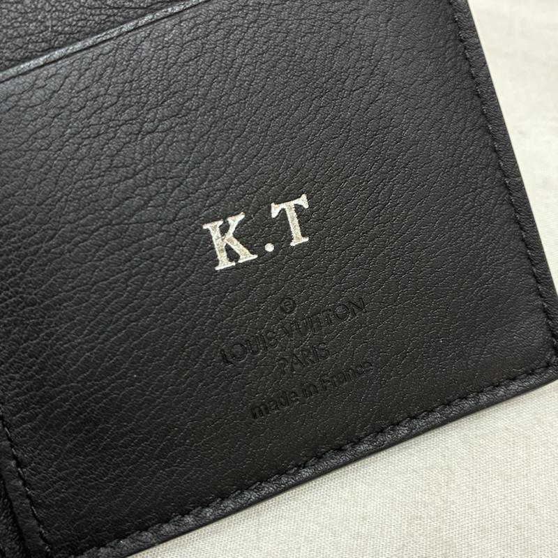 ルイヴィトン LOUIS VUITTON 財布 長財布 M58802 アエログラム ポルトフォイユ ブラザ トリヨン レザー LV ロゴ 型押し 長財布 - ロゴ、文字 X ワンポイント 黒 / ブラック / black メンズ USED 古着 中古 50157644
