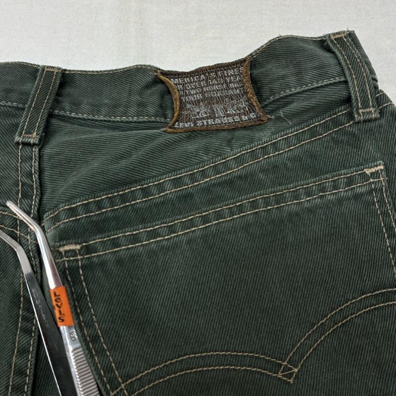 リーバイス Levi s パンツ デニム、ジーンズ 90s 93年 ベルギー製 ユーロリーバイス 後染め テーパード カラー デニムパンツ オレンジタブ 33インチ メンズ USED 古着 中古 50159631