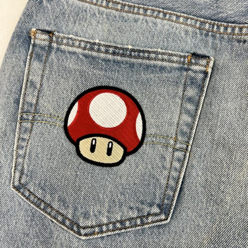 リーバイス Levi s パンツ ショートパンツ スーパーマリオ コラボ カットオフ デニム ショートパンツ 32インチ メンズ USED 古着 中古 50159759