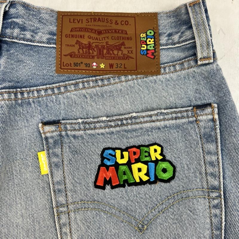 リーバイス Levi s パンツ ショートパンツ スーパーマリオ コラボ カットオフ デニム ショートパンツ 32インチ メンズ USED 古着 中古 50159759