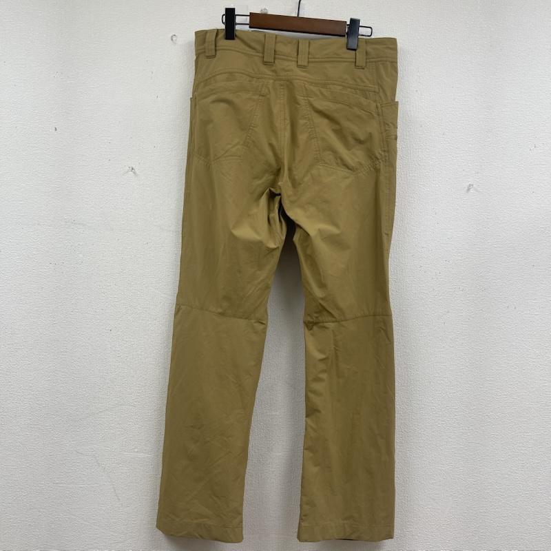 アークテリクス ARC TERYX パンツ ワークパンツ、ペインターパンツ トレッキング ナイロン ワーク パンツ 10262-66648 32インチ マスタード / マスタード / メンズ USED 古着 中古 50159910