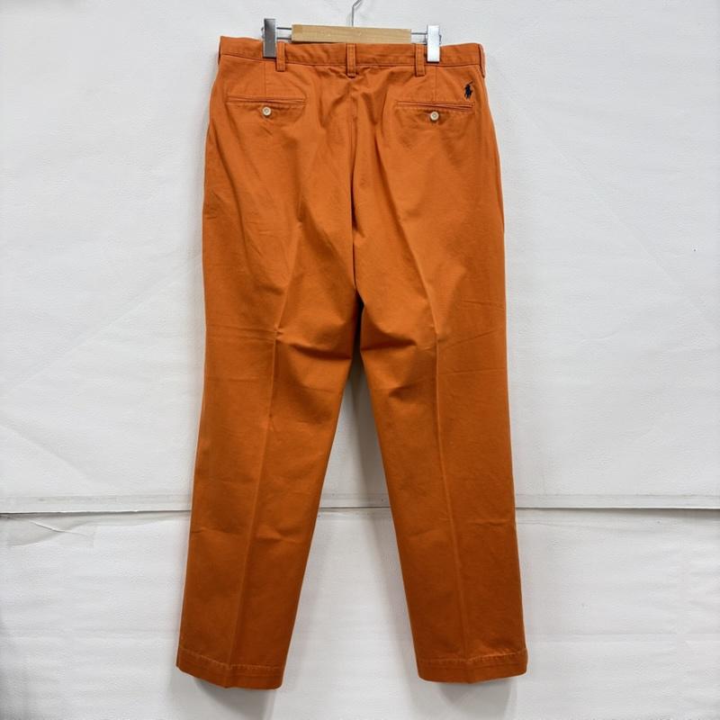 ポロバイラルフローレン Polo by RALPH LAUREN パンツ チノパン 90s チノパン カジュアル フォーマル パンツ ジッパーフライ ヴィンテージ ポニー刺繡 35インチ 無地 X ワンポイント X ロゴ、文字 X 刺繍 橙 / オレンジ / orange メンズ USED 古着 中古 50160522