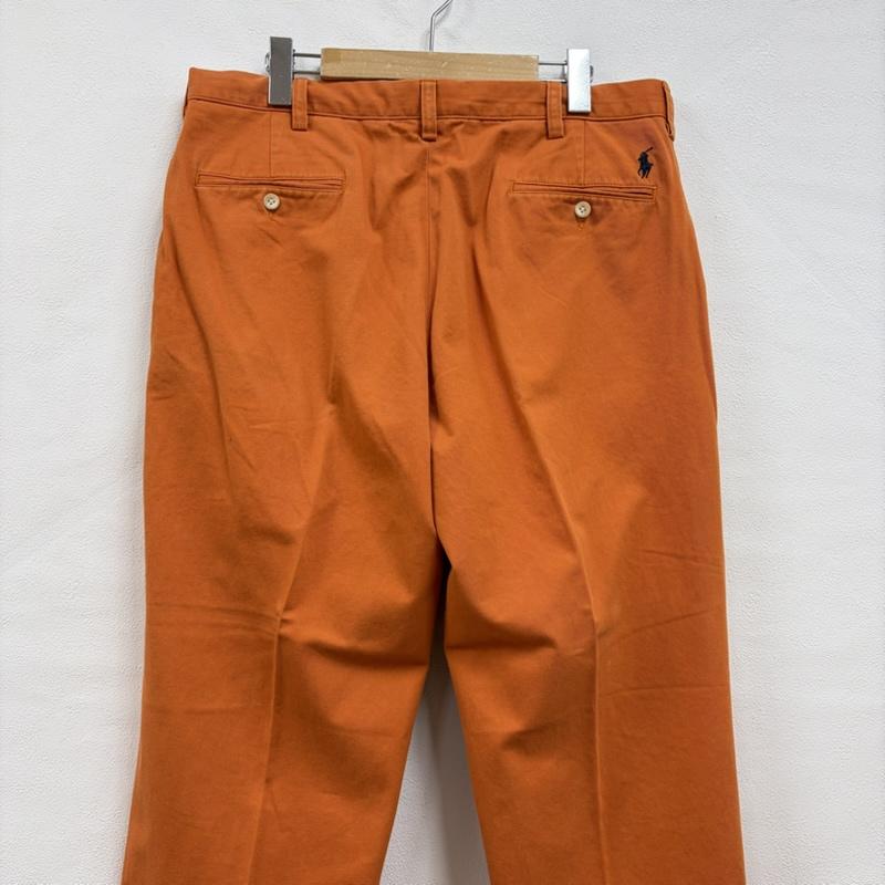ポロバイラルフローレン Polo by RALPH LAUREN パンツ チノパン 90s チノパン カジュアル フォーマル パンツ ジッパーフライ ヴィンテージ ポニー刺繡 35インチ 無地 X ワンポイント X ロゴ、文字 X 刺繍 橙 / オレンジ / orange メンズ USED 古着 中古 50160522