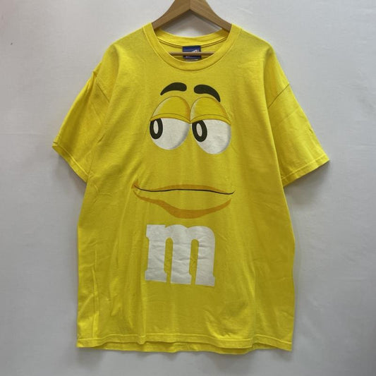 フルーツオブザルーム FRUIT OF THE LOOM Tシャツ 半袖 M&M’s エムアンドエムズ キャラT ビッグ プリント ロゴ XL プリント X キャラクター 黄 / イエロー / yellow メンズ USED 古着 中古 50161025