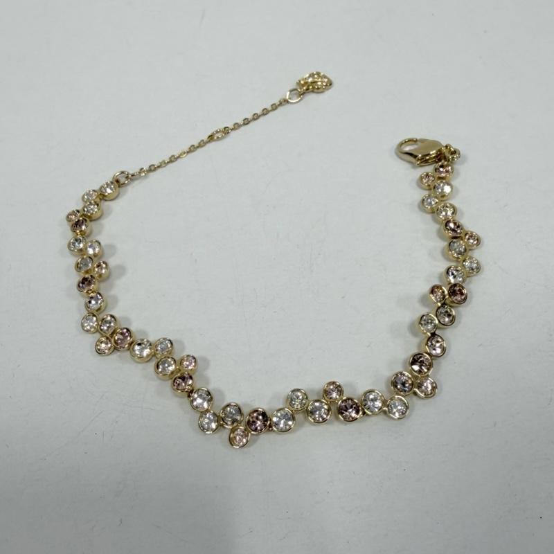 スワロフスキー SWAROVSKI アクセサリー ブレスレット、バングル クリア ピンク クリスタル スワロフスキー ブレスレット ウェーブ デザイン - 金 / ゴールド / gold color X 透明 / クリア / X 桃 / ピンク / pink レディース USED 古着 中古 50161106