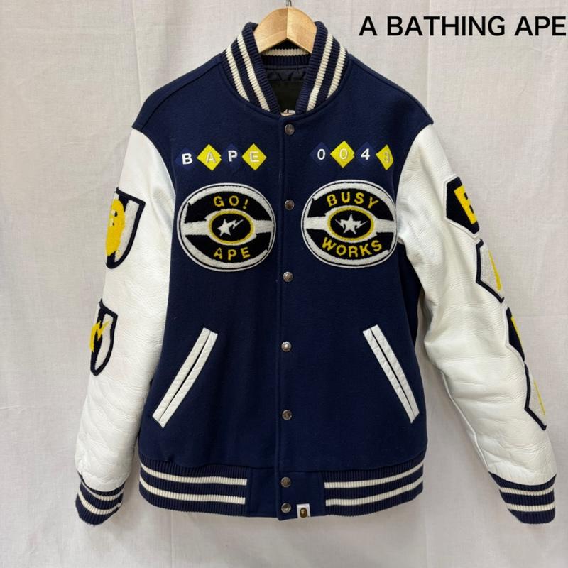 アベイシングエイプ A BATHING APE ジャケット、上着 ジャンパー、ブルゾン BAPY スタジアムジャンパー スタジャン レザー シリアルナンバー入り ワッペン 刺繍 M ロゴ、文字 黄 / イエロー / yellow X 白 / ホワイト / white X 紺 / ネイビー / navy メンズ USED 古着 中古 50161247