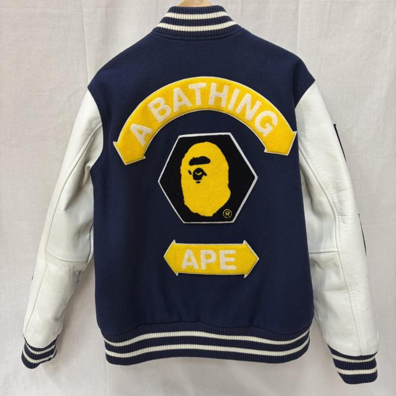 アベイシングエイプ A BATHING APE ジャケット、上着 ジャンパー、ブルゾン BAPY スタジアムジャンパー スタジャン レザー シリアルナンバー入り ワッペン 刺繍 M ロゴ、文字 黄 / イエロー / yellow X 白 / ホワイト / white X 紺 / ネイビー / navy メンズ USED 古着 中古 50161247