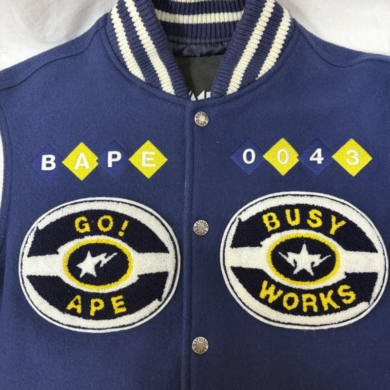 アベイシングエイプ A BATHING APE ジャケット、上着 ジャンパー、ブルゾン BAPY スタジアムジャンパー スタジャン レザー シリアルナンバー入り ワッペン 刺繍 M ロゴ、文字 黄 / イエロー / yellow X 白 / ホワイト / white X 紺 / ネイビー / navy メンズ USED 古着 中古 50161247