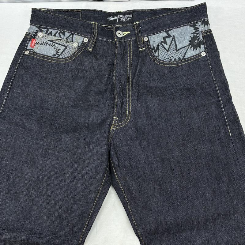 ステューシー STUSSY パンツ デニム、ジーンズ ROUGH AND RUGGED DENIM 裏総柄 切替 デニムパンツ 30インチ メンズ USED 古着 中古 50161425