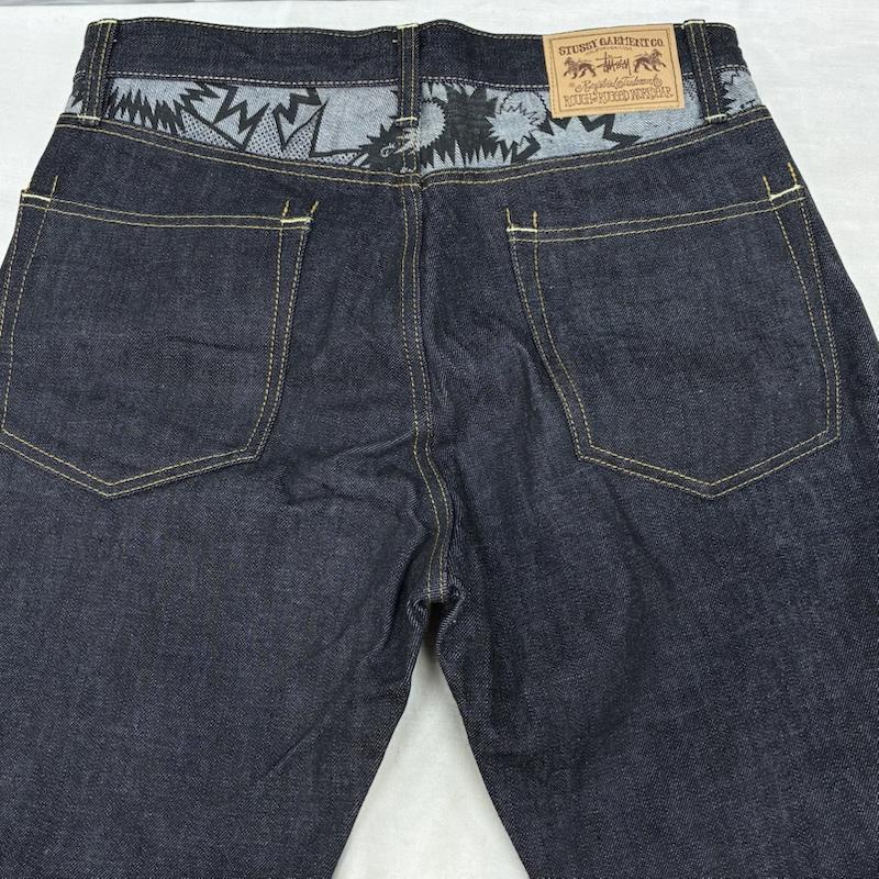 ステューシー STUSSY パンツ デニム、ジーンズ ROUGH AND RUGGED DENIM 裏総柄 切替 デニムパンツ 30インチ メンズ USED 古着 中古 50161425