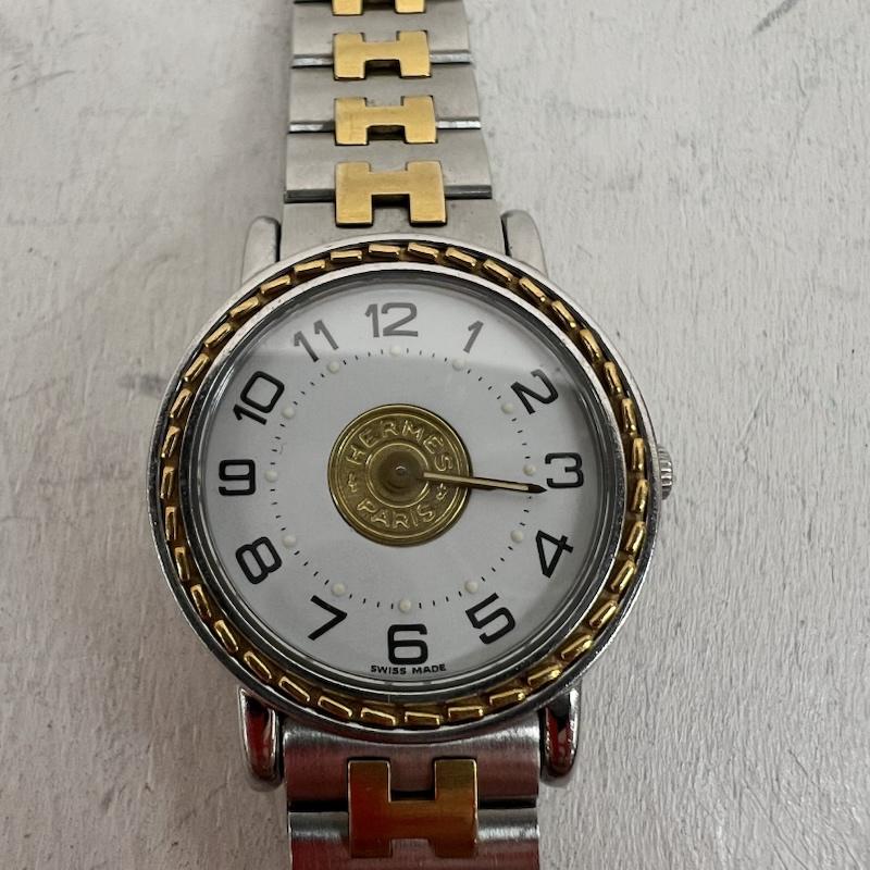 エルメス HERMES 腕時計 アナログ（クォーツ式） セリエ Serie コインモチーフ 純正ブレス SE4.220 - 銀 / シルバー / silver color X 金 / ゴールド / gold color レディース USED 古着 中古 50161715
