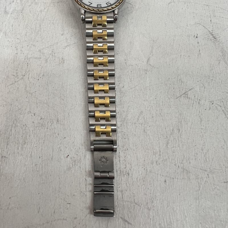 エルメス HERMES 腕時計 アナログ（クォーツ式） セリエ Serie コインモチーフ 純正ブレス SE4.220 - 銀 / シルバー / silver color X 金 / ゴールド / gold color レディース USED 古着 中古 50161715