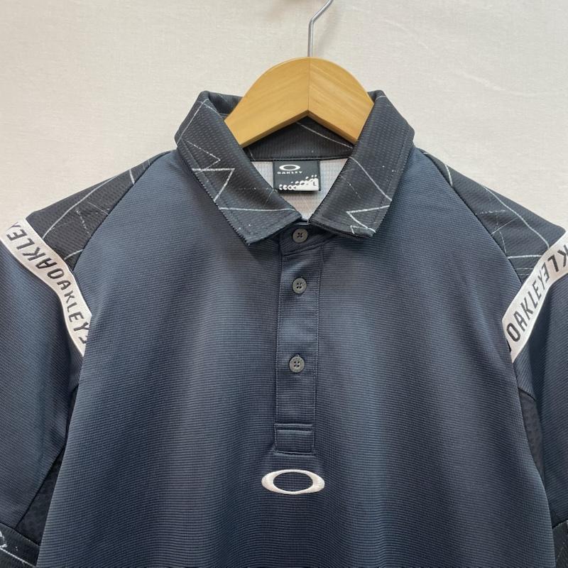オークリー OAKLEY ポロシャツ 半袖 ゴルフ シャツ 黒 ワンポイント ブランド ロゴ 幾何学模様 L 幾何柄 紺 / ネイビー / navy メンズ USED 古着 中古 50162098