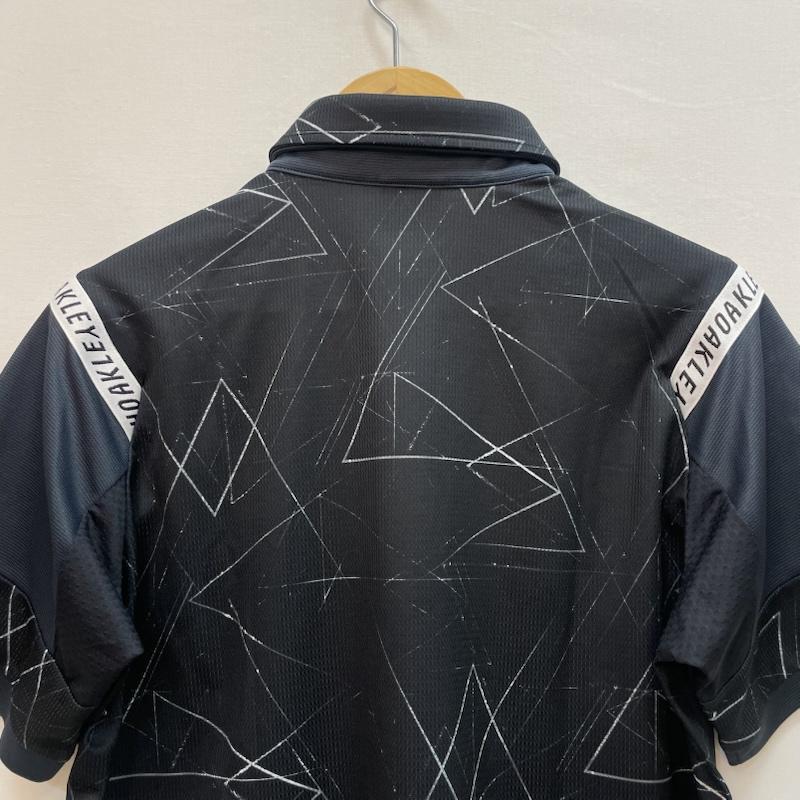 オークリー OAKLEY ポロシャツ 半袖 ゴルフ シャツ 黒 ワンポイント ブランド ロゴ 幾何学模様 L 幾何柄 紺 / ネイビー / navy メンズ USED 古着 中古 50162098